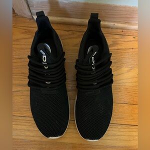 Black adidas tennis shoes with white detailing. Barely worn in good condition.